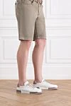 Сникеры Portofino Yacht из мятой телячьей кожи белые Dolce & Gabbana - задник с логотипом. 75% телячья кожа 25% кожа ягненка. подошва из кожи. шнуровка. Стелька: из телячьей кожи с фирменным лейблом. Страна производитель: Италия. Уход: специализированная чистка - фото 2