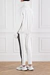 Спортивный костюм Dirty White белый с логотипом Balenciaga - логотип бренда, лампасы на штанинах. 100% полиэстер. застежка-молния. два боковых кармана. Страна производитель: Италия. Уход: специализированная чистка - фото 4