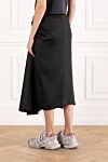Женская юбка с драпировкой из черного купро-твила Balenciaga - драпировка. 100% купро-твил. застежка на молнию и крючок сзади. Страна производитель: Италия. Уход: специализированная чистка - фото 4
