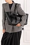 Women's Bel Air Carry All Bag Large Black Balenciaga - Decoration: embossed Balenciaga Paris logo, logo engraved on the clasp. Material: 100% calf leather. Dimensions: 44 X 30 X 19 CM. Strap length: adjustable shoulder strap. Handle length: two handles (height: 24 inches). wide front pocket, 2 internal zipped pockets, . 2 internal flat pockets. twist lock. Country of manufacture: Italy. Care: specialized cleaning - photo 2