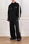 Спортивный костюм чёрного цвета с белым кантом Balenciaga - логотип бренда. 100% полиэстер. молния. два боковых кармана. Страна производитель: Италия. Уход: специализированная чистка - фото 2