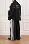 Спортивный костюм чёрного цвета с белым кантом Balenciaga - логотип бренда. 100% полиэстер. молния. два боковых кармана. Страна производитель: Италия. Уход: специализированная чистка - фото 4