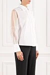 D.Exterior An elegant white blouse with light translucent sleeves and a strict collar - Decoration: sheer sleeves. 66% silk, 18% polyamide, 3% elastane. buttons. Country of manufacture: Italy. Care: specialized cleaning - photo 3
