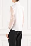 An elegant white blouse with light translucent sleeves and a strict collar D.Exterior - Decoration: sheer sleeves. 66% silk, 18% polyamide, 3% elastane. buttons. Country of manufacture: Italy. Care: specialized cleaning - photo 4