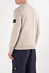 Мужской джемпер из мягкой шерсти бежевого оттенка Stone Island - нашивка с фирменным логотипом. 80% шерсть, 20% полиамид. Страна производитель: Италия. Уход: специализированная чистка - фото 4