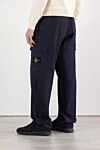 Свободные брюки-карго с карманами и манжетами на шнурках синие Stone Island - 100% хлопок. два боковых кармана, два кармана на штанинах, один задний карман . кулиска, молния. Страна производитель: Италия. Уход: специализированная чистка - фото 4