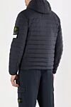 Пуховик глубокого синего цвета с горизонтальной стежкой Stone Island - эмблема бренда. Допонительно: капюшон. 86% полиамид, 14% эластан . 2 боковых кармана. молния. Утеплитель: пух. Страна производитель: Италия. Уход: специализированная чистка - фото 4