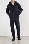 Men's insulated jacket with a branded patch on the sleeve Stone Island - Decoration: brand emblem. hood. Material: 100% polyester. 2 side pockets. zipper. Country of manufacture: Italy. Care: specialized cleaning - photo 2