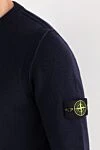 Stone Island Knitted blue lambswool jumper with a round neck - Decoration: brand logo on the sleeve. 80% wool, 20% polyamide. Country of manufacture: Italy. Care: specialized cleaning - photo 5