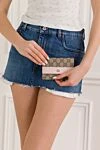Gucci Портмоне - Страна производитель: Италия. Уход: специализированная чистка - фото 1