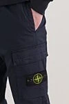 Stone Island Штани-карго стандартного звуженого крою з поясом на шнурівці - фірмовий патч. 97% бавовна, 3% поліамід. блискавка, куліска. Кишені дертикальні бічні кишені з потайною блискавкою. Накладні кишені-гармошки з клапаном та потайною подвійною кнопкою. Задня кишеня з фіксованим клапаном та потайною кнопкою. Країна виробник: Італія. Догляд: спеціалізоване чищення - фото 5