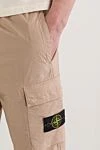 Stone Island Брюки-карго бежеві звуженого крою з поясом на шнурівці - фірмовий патч. 97% бавовна, 3% поліамід. блискавка, куліска. Кишені дертикальні бічні кишені з потайною блискавкою. Накладні кишені-гармошки з клапаном та потайною подвійною кнопкою. Задня кишеня з фіксованим клапаном та потайною кнопкою. Країна виробник: Італія. Догляд: спеціалізоване чищення - фото 5