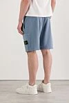 Спортивні блакитні шорти з органічного бавовняного флісу Stone Island - 100% бавовна. дві бічні кишені, одна задня, одна на штаніні. куліска, блискавка. Країна виробник: Італія. Догляд: спеціалізоване чищення - фото 4