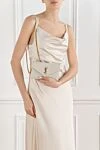 Белая сумочка на цепочке с логотипом и культовой стеганой строчкой Saint Laurent - логотип Cassandre и стеганая строчка в ??виде шевронов.. 100% натуральная кожа. Размеры: 19 x 12,5 x 3,5 см. Застежка на кнопку. Длина ремешка: 55 см. один слот для карты, один карман на молнии. Страна производитель: Франция. Уход: специализированная чистка - фото 2