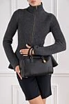 Amazona 28 bag in black nappa calfskin Loewe - Decoration: Embossed Loewe anagram. Material: 100% genuine leather. Dimensions: 18 x 28 x 11 cm. Zip closure with two leather pull tabs. One patch pocket, one padlock key pocket. Belt length: 85 - 113 cm. Country of manufacture: Italy. Care: specialized cleaning - photo 2