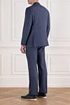 Classic men's suit, dark, with barely noticeable stripes Brioni - Slit. 88% wool, 12% silk. Closure: Buttons, hook. Chest pocket, two flap pockets. Three pockets. Two side pockets, two back pockets with buttons. Lining: 100% cupro. Country of manufacture: Italy. Care: specialized cleaning - photo 4