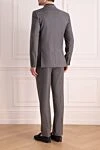 Костюм чоловічий з вовни та шовку сірий Brioni - Візерунок смужка, шліця. 85% вовна, 15% шовк. гудзики, гачок. Нагрудна кишеня, дві кишені з клапанами. Три кишені. Дві бічні кишені, дві кишені ззаду на гудзиках. 100% купро. Країна виробник: Італія. Догляд: спеціалізоване чищення - фото 4