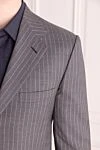 Brioni Костюм чоловічий з вовни та шовку сірий - Візерунок смужка, шліця. 85% вовна, 15% шовк. гудзики, гачок. Нагрудна кишеня, дві кишені з клапанами. Три кишені. Дві бічні кишені, дві кишені ззаду на гудзиках. 100% купро. Країна виробник: Італія. Догляд: спеціалізоване чищення - фото 5
