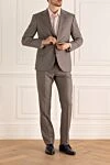 Костюм мужской из шерсти бежевый Brioni - Шлица. 100% шерсть. Пуговицы, крючок. Нагрудный карман, два кармана с клапанами. Карманы (внутренние): Три кармана. Два боковых кармана, два кармана сзади на пуговицах. 100% купро. Страна производитель: Италия. Уход: специализированная чистка - фото 2