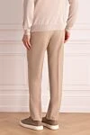 Штани бежеві чоловічі Brioni - защипи. 85% вовна, 10% кашемір, 5% шовк. гудзик, блискавка. кишеня під поясом, дві бічні кишені, дві кишені ззаду з клапанами на гудзиках. Країна виробник: Італія. Догляд: спеціалізоване чищення - фото 4