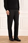Brioni Штани чорні чоловічі - защипи. 85% вовна, 10% кашемір, 5% шовк. гудзик, блискавка. кишеня під поясом, дві бічні кишені, дві кишені ззаду з клапанами на гудзиках. Країна виробник: Италия. Догляд: спеціалізоване чищення - фото 3