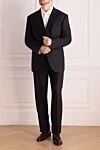 Black wool and silk men's suit Brioni - Slit. 85% wool, 15% silk. Closure: Buttons, hook. Chest pocket, two flap pockets. Three pockets. Two side pockets, two back pockets with buttons. Lining: 100% cupro. Country of manufacture: Italy. Care: specialized cleaning - photo 2