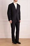 Brioni Black wool and silk men's suit - Slit. 85% wool, 15% silk. Closure: Buttons, hook. Chest pocket, two flap pockets. Three pockets. Two side pockets, two back pockets with buttons. Lining: 100% cupro. Country of manufacture: Italy. Care: specialized cleaning - photo 3