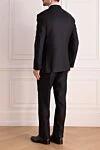 Black wool and silk men's suit Brioni - Slit. 85% wool, 15% silk. Closure: Buttons, hook. Chest pocket, two flap pockets. Three pockets. Two side pockets, two back pockets with buttons. Lining: 100% cupro. Country of manufacture: Italy. Care: specialized cleaning - photo 4