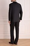 Men's suit made of wool, cashmere and silk black Brioni - Slit. 80% wool, 15% silk, 5% cashmere. Closure: Buttons, hook. Chest pocket, two flap pockets. Three pockets. Two side pockets, two back pockets with buttons. Lining: 100% cupro. Country of manufacture: Italy. Care: specialized cleaning - photo 4