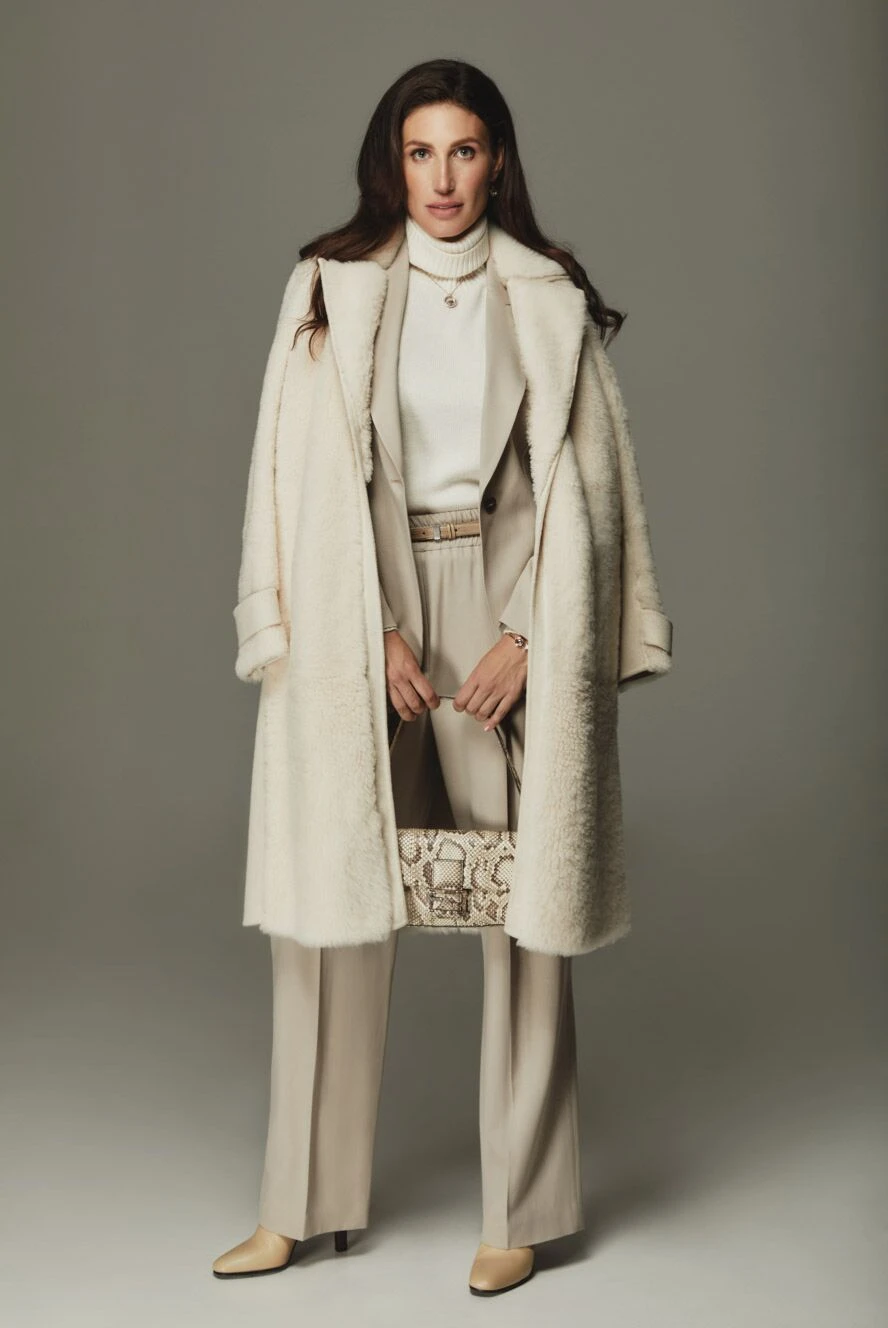 Loro Piana women's milky-colored fur coat with a belt at the waist