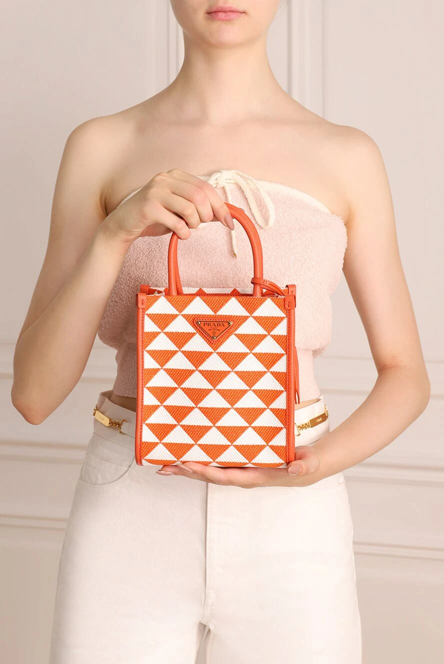 Prada Orange textile bag for women - triangular metal logo, geometric pattern all over the surface. textile. zipper. Country of manufacture: Italy. Care: specialized cleaning - photo 1