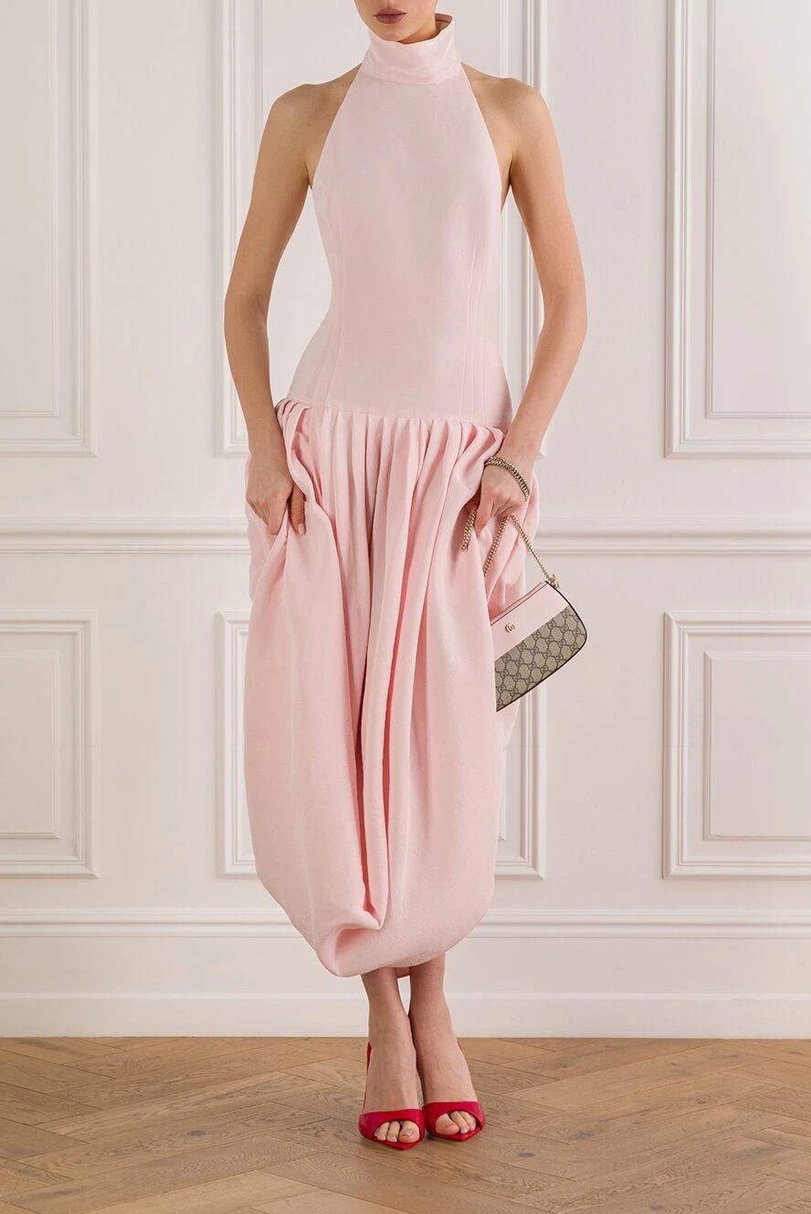 Magda Butrym a soft pink midi dress with an open back and draping