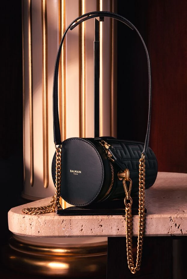 Balmain women's black genuine leather bag in a cylindrical shape with embossing 176488 - photo 2