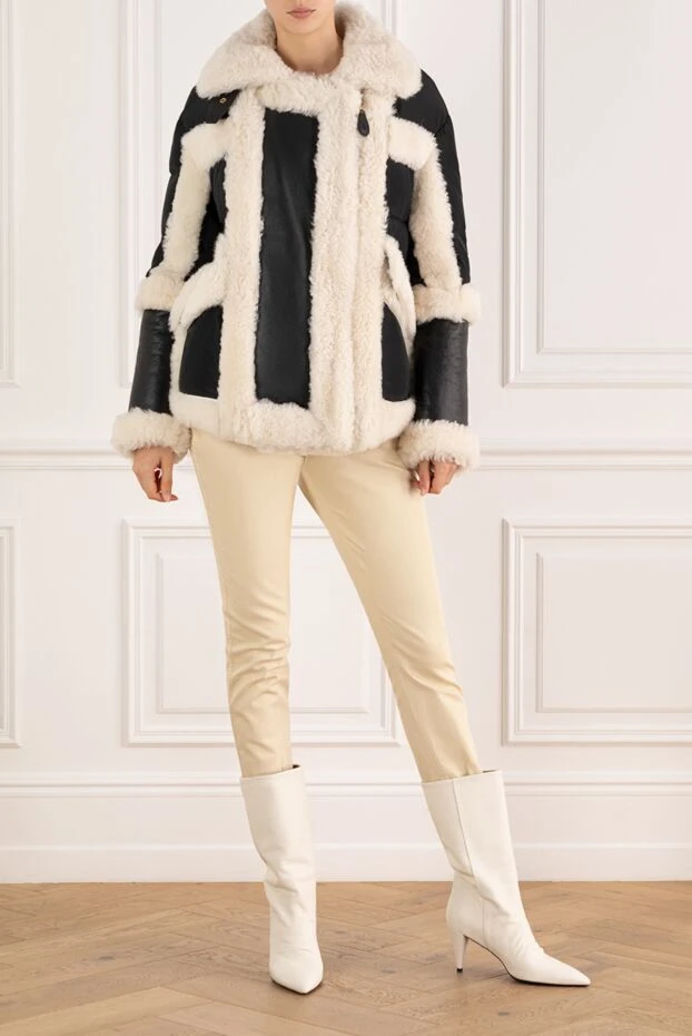 Women's down jacket made of black leather, white fur and textiles - photo 2