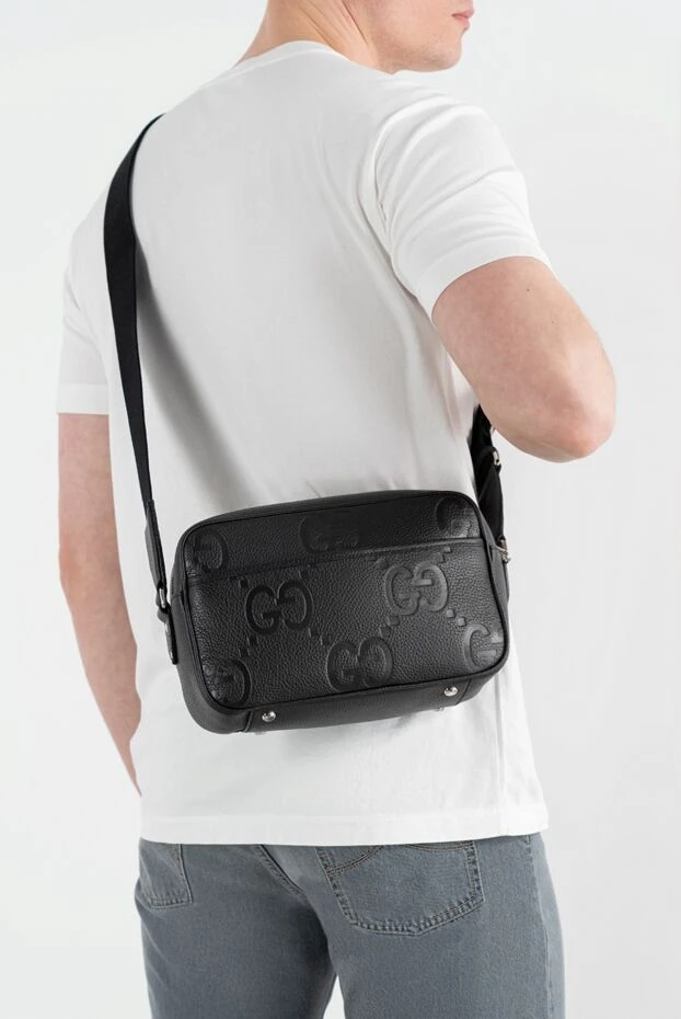 Gucci men's stylish leather bag with a shoulder strap and embossed decor 186760 - photo 2