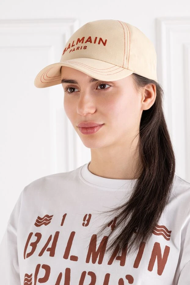 A sand-colored cotton cap with embroidery and a curved visor - photo 1