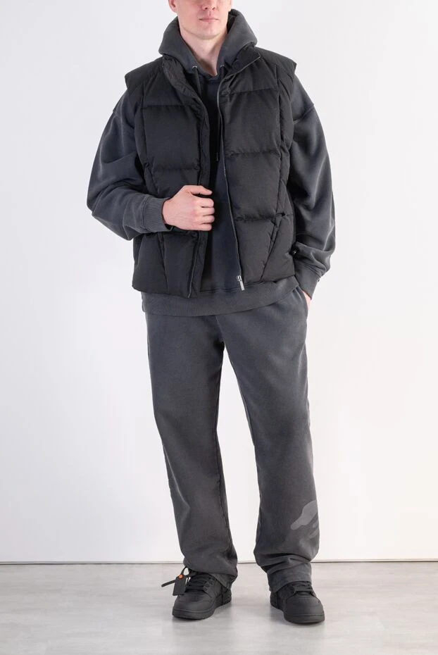 An original black vest with a zipper from the brand. - photo 2
