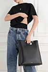 Alaia  - ручка в ??форме бобины.. 100% натуральная кожа. Размеры (см): Д34 x В40 x Г14.. Страна производитель: Франция. Уход: специализированная чистка - фото 9