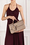  Dolce & Gabbana - логотип. 100% телячьей кожи plonge. Длина ремня: регулируемый кожаный плечевой ремень. Размеры: В 20 x Ш 30 x Г 13 см. внутри карман на молнии. застежка-молния. Страна производитель: Италия. Уход: специализированная чистка - фото 8